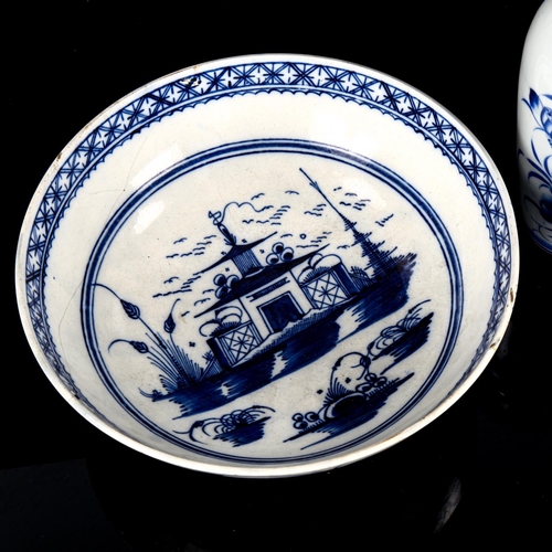 1135 - A Worcester tin glazed blue and white pottery bowl, diameter 26cm, and an Oriental blue and white va... 