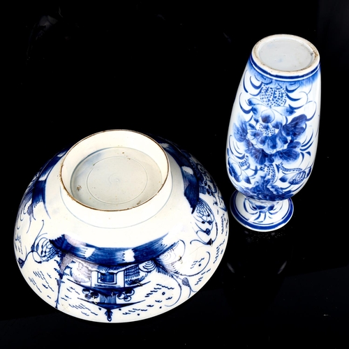 1135 - A Worcester tin glazed blue and white pottery bowl, diameter 26cm, and an Oriental blue and white va... 