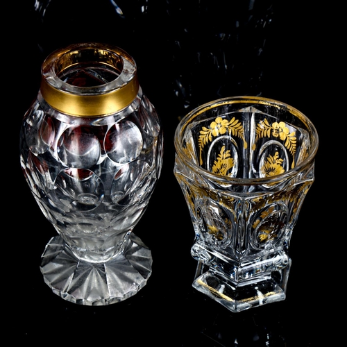 1136 - A Bohemian glass goblet with gilded panels, height 11cm, and a faceted glass vase with painted panel... 