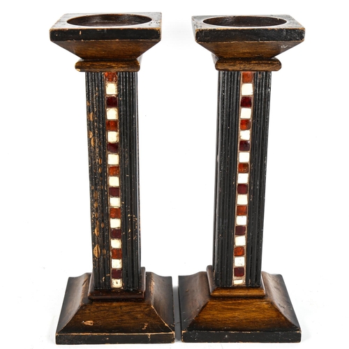 1139 - A pair of Finnish Arts and Crafts square-section painted wood candle stands, with inlaid bands of mo... 