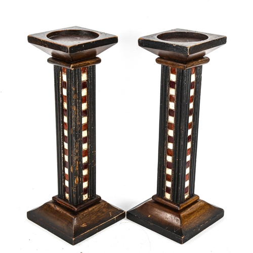 1139 - A pair of Finnish Arts and Crafts square-section painted wood candle stands, with inlaid bands of mo... 