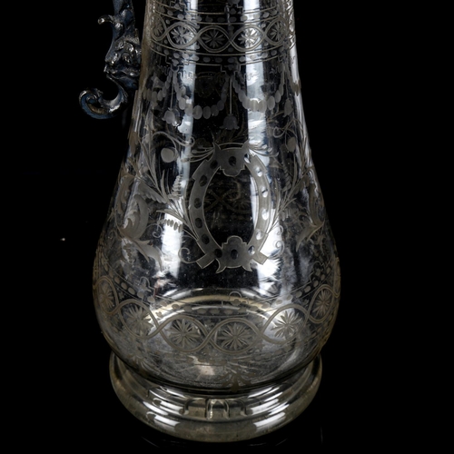 1148 - An ornate 19th century etched glass Claret jug, with cast pewter mount, height 36cm