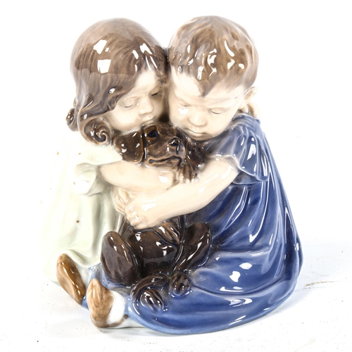 1156 - Royal Copenhagen porcelain group, 2 children with a puppy, model no, 707, height 15cm