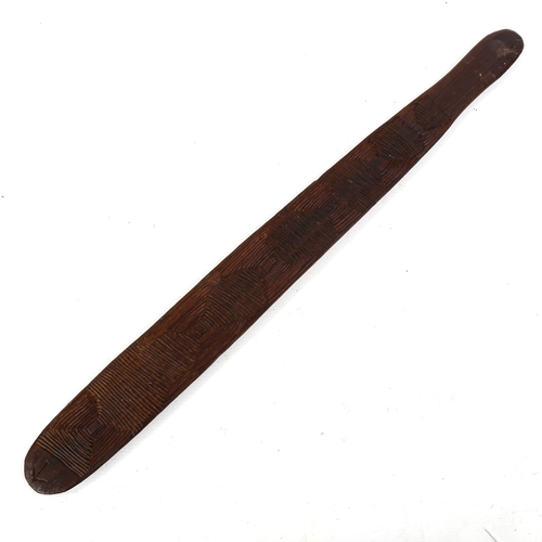 1163 - An African Tribal hardwood club, with carved geometric designs, probably early to mid-20th century, ... 