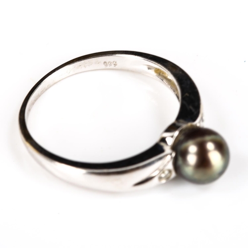 251 - A modern 14ct white gold black cultured pearl and diamond dress ring, pearl diameter 6.8mm, size Q, ... 