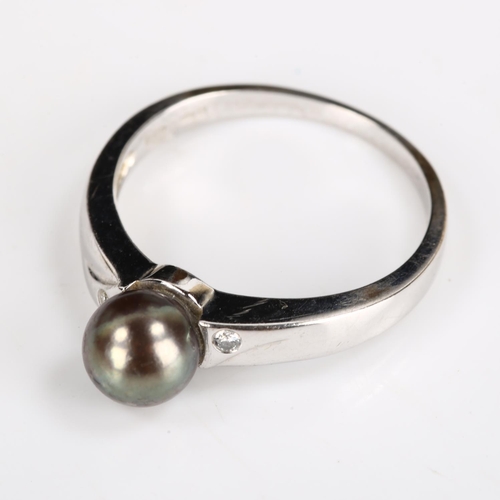 251 - A modern 14ct white gold black cultured pearl and diamond dress ring, pearl diameter 6.8mm, size Q, ... 