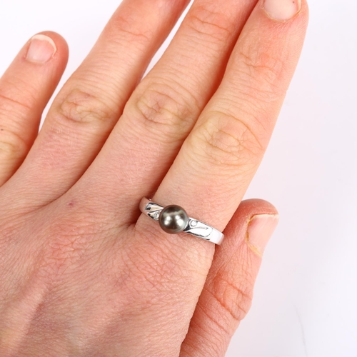 251 - A modern 14ct white gold black cultured pearl and diamond dress ring, pearl diameter 6.8mm, size Q, ... 