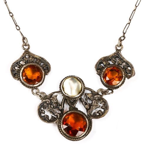 255 - A Continental Arts and Crafts unmarked silver citrine and blister pearl necklace, pierced floral des... 