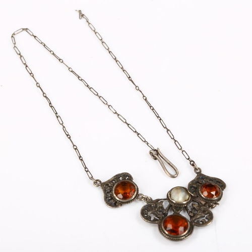255 - A Continental Arts and Crafts unmarked silver citrine and blister pearl necklace, pierced floral des... 