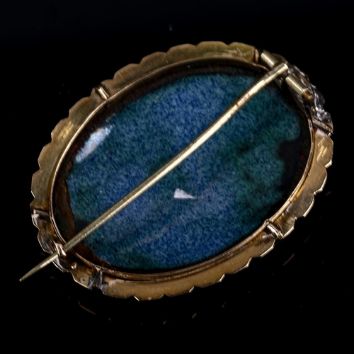 256 - An Antique Swiss hand painted enamel on copper panel brooch, unmarked gold frame, brooch length 43.7... 