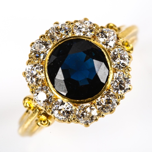 259 - A late 20th century 18ct gold sapphire and diamond cluster ring, set with round-cut sapphire and old... 