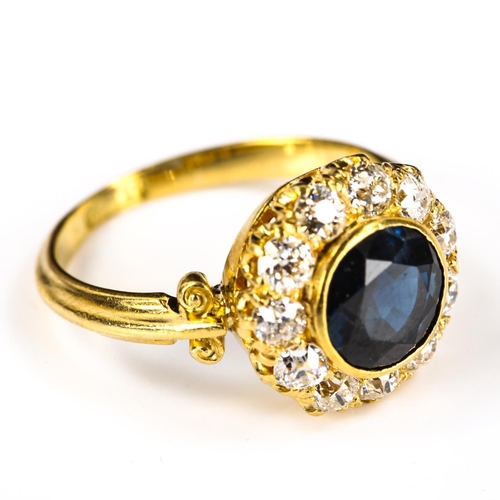259 - A late 20th century 18ct gold sapphire and diamond cluster ring, set with round-cut sapphire and old... 