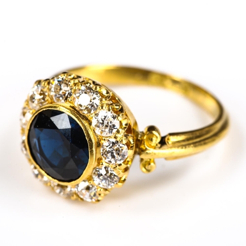 259 - A late 20th century 18ct gold sapphire and diamond cluster ring, set with round-cut sapphire and old... 