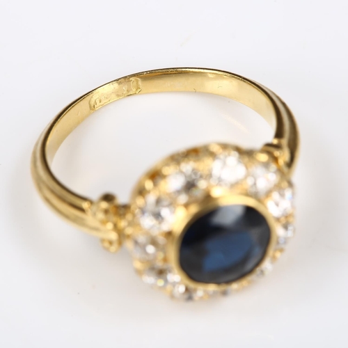 259 - A late 20th century 18ct gold sapphire and diamond cluster ring, set with round-cut sapphire and old... 