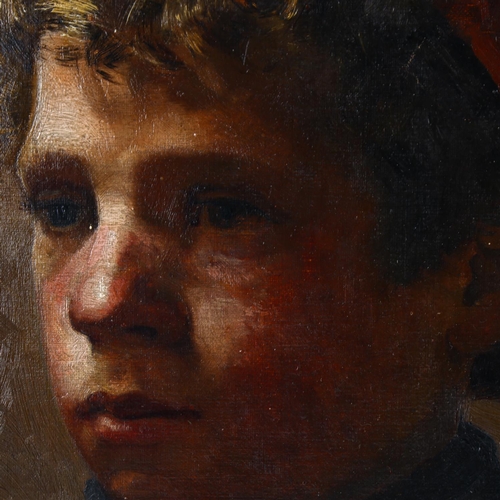 2006 - A late 19th century oil on canvas, portrait of a boy with a red cap, unsigned, 43cm x 35cm, framed