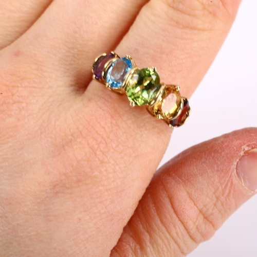 419 - A modern 9ct gold graduated 5-stone gem set ring, gemstones include peridot, topaz, garnet and ameth... 