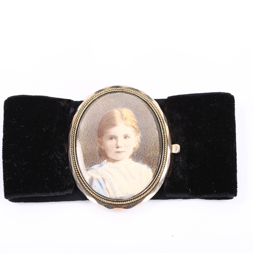 422 - A Victorian portrait frame bracelet, unmarked yellow metal settings on black velvet strap, with prin... 