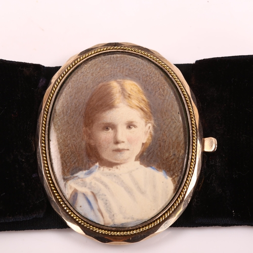 422 - A Victorian portrait frame bracelet, unmarked yellow metal settings on black velvet strap, with prin... 