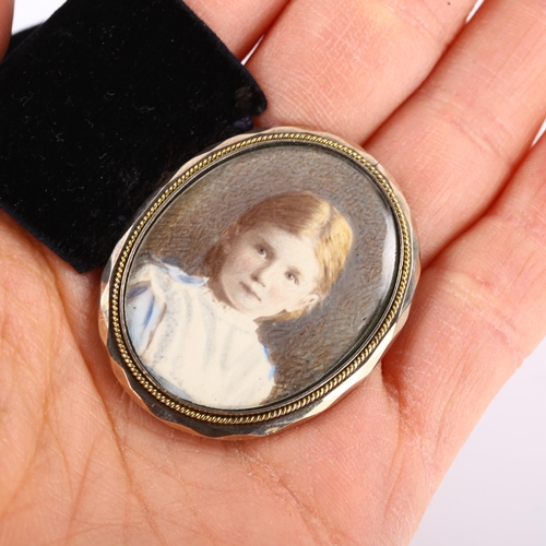 422 - A Victorian portrait frame bracelet, unmarked yellow metal settings on black velvet strap, with prin... 