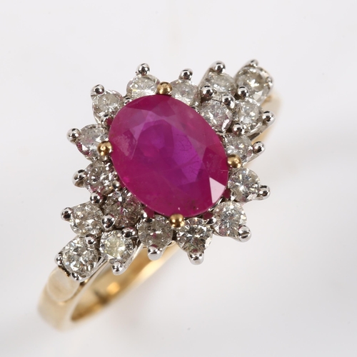 423 - A modern 9ct gold ruby and diamond cluster dress ring, set with oval mixed-cut ruby and modern round... 