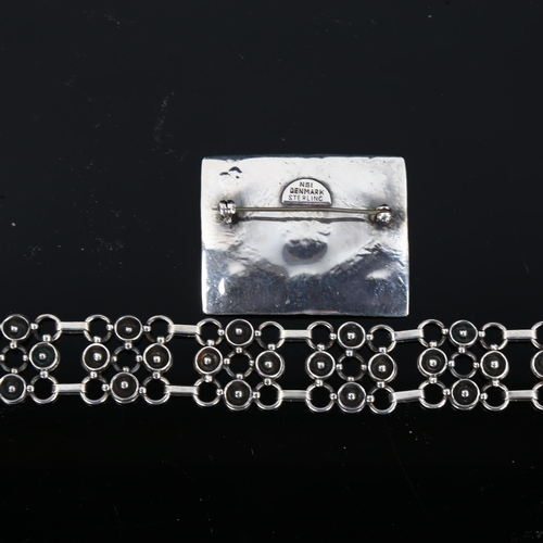 432 - A Vintage Danish silver panel bracelet and rug brooch, makers include Nordisk-Smykke Industri, brace... 