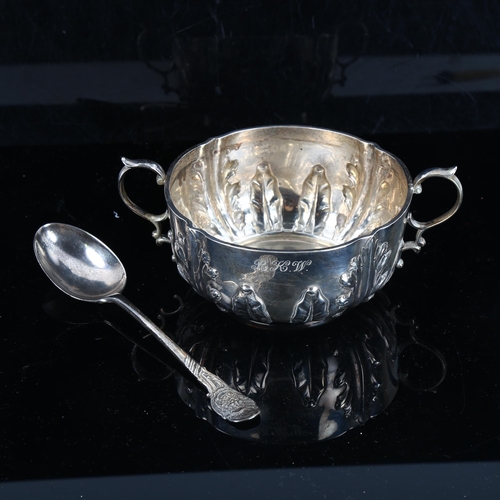 441 - A cased Victorian silver porringer and spoon eating set, relief embossed acanthus leaf decoration, b... 