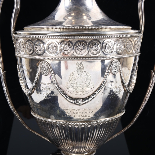 444 - A large George III silver 2-handled lidded trophy, with military presentation inscriptions for the Q... 