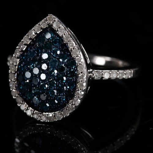 456 - A modern sterling silver blue diamond and pear cluster dress ring, total diamond content approx 1ct,... 