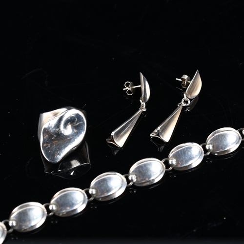 463 - A group of Danish stylised sterling silver jewellery, comprising bracelet, ring and pair of earrings... 