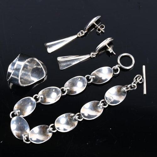 463 - A group of Danish stylised sterling silver jewellery, comprising bracelet, ring and pair of earrings... 