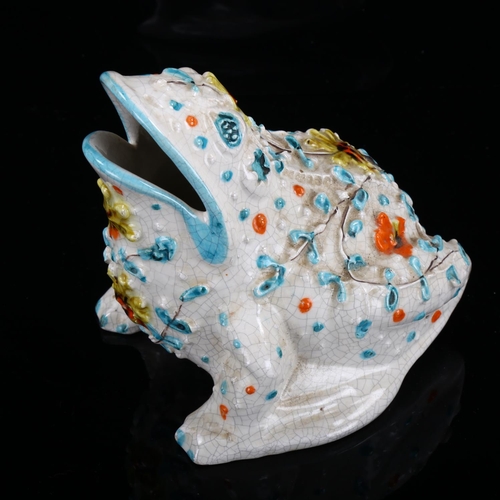 1242 - An Italian pottery ornamental frog with relief moulded decoration, height 14cm