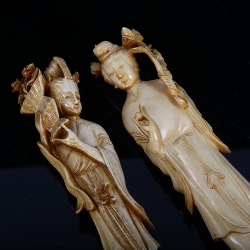 1243 - A pair of Japanese carved ivory standing figures, early 20th century, on wood bases, height 20cm