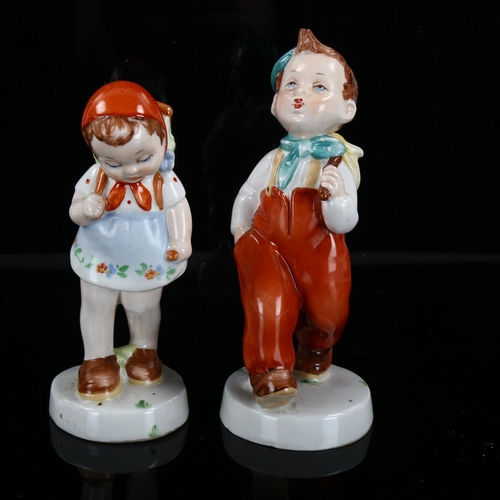 1244 - A pair of Royal Dux ceramic children figures, height 16cm