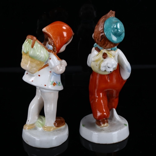 1244 - A pair of Royal Dux ceramic children figures, height 16cm