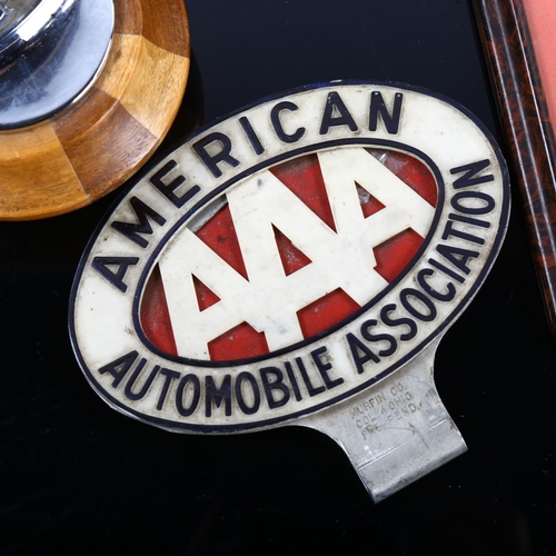 1247 - A group lot, including American AAA motoring badge, a mid-20th century photo frame, a table lighter,... 