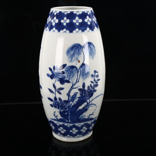 1250 - A Chinese blue and white porcelain vase of bulbous form, hand painted flowers, height 37cm