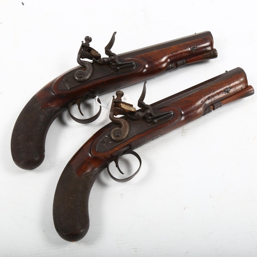 1261 - A pair of 18th century flintlock pistols by E Bond, length 27cm