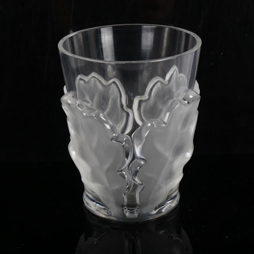 1282 - R LALIQUE - a tapered glass vase with relief moulded opaque glass oakleaf surround, height 12cm, dia... 