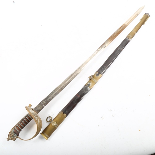 1284 - A Navy dress sword with etched blade and brass-mounted leather scabbard, by Manton & Co England