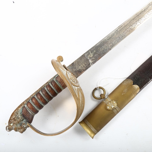 1284 - A Navy dress sword with etched blade and brass-mounted leather scabbard, by Manton & Co England