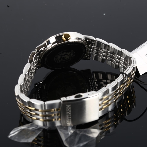 14 - CITIZEN - a gold plated stainless steel Echo-Driver quartz bracelet watch, ref. E101-S031940, black ... 