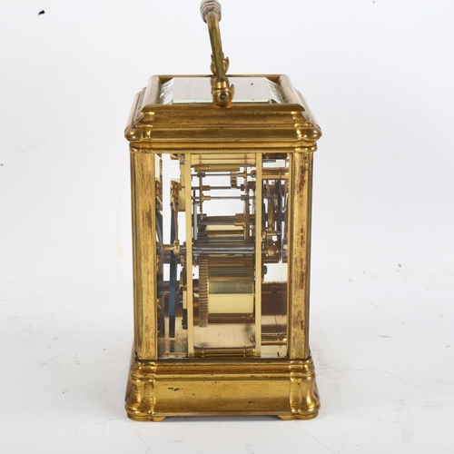 62 - A large French brass-cased carriage clock, white enamel dial with Roman numeral hour markers and exh... 