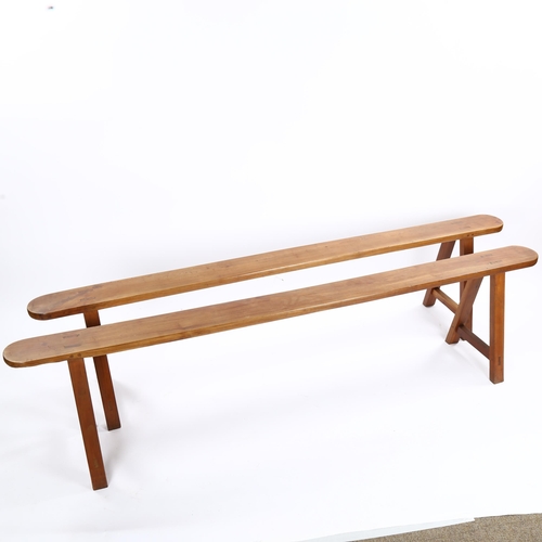 1154 - A pair of cherrywood trestle benches on A-frame supports, length 198cm