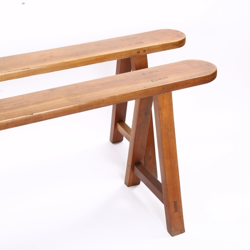 1154 - A pair of cherrywood trestle benches on A-frame supports, length 198cm