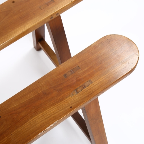 1154 - A pair of cherrywood trestle benches on A-frame supports, length 198cm