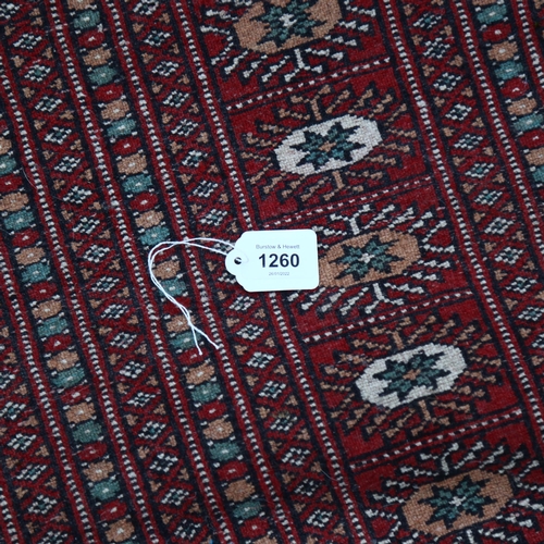 1260 - A large red ground Tekke rug, 380cm x 280cm