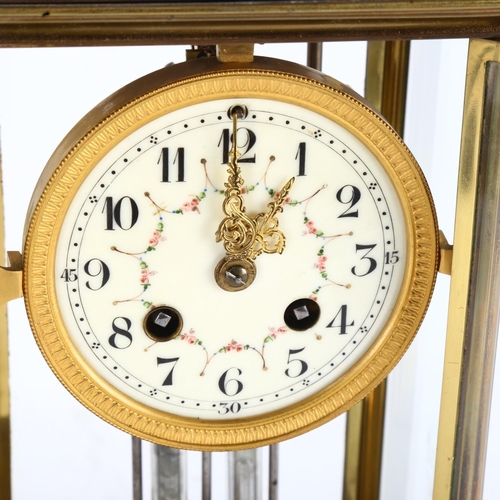 25 - An early 20th century brass 4-glass 8-day mantel clock, hand painted white enamel dial with Arabic n... 