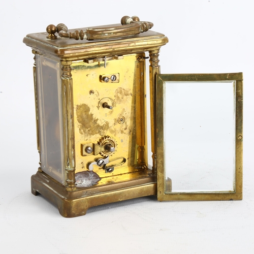 39 - A Mappin & Webb brass-cased carriage clock, white enamel dial with Roman numeral hour markers, case ... 