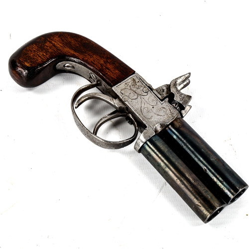 1234 - A 19th century percussion over and under pocket pistol, with double hammers and trigger, length 18cm