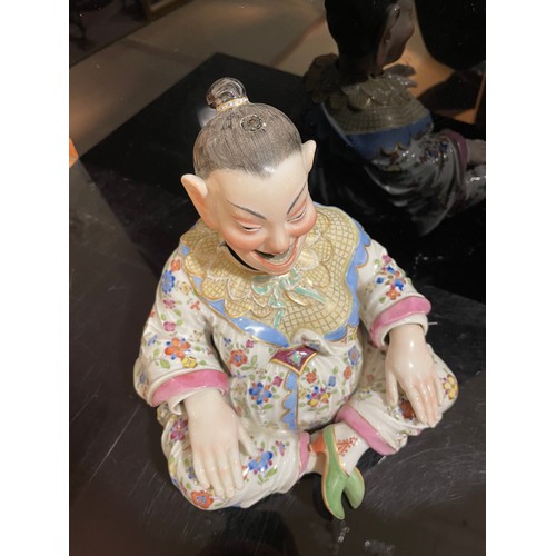 1013 - A Meissen porcelain nodding Pagoda figure, 19th century, seated form with wagging tongue and articul... 